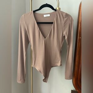 Size small, longe sleeved v-neck Babaton bodysuit